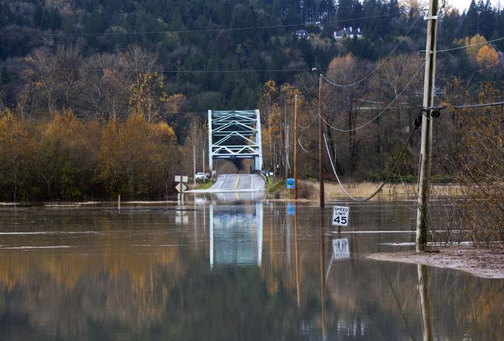 Flood waters over a country road in the Snoqualmie Valley.